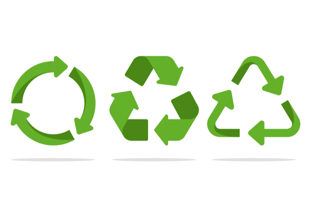 a group of green recycle symbols